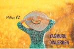 YAĞMURU DİNLERKEN